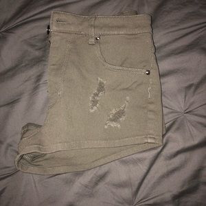 Olive green ripped shorts